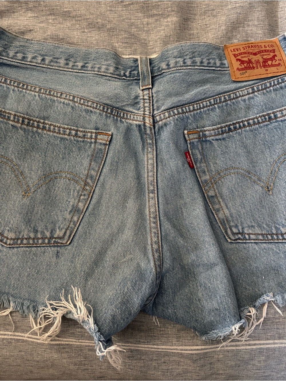 501 Levi's Women's Light Wash Cutoff Denim Shorts
